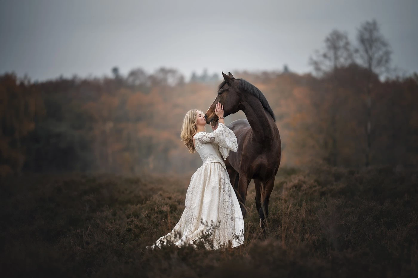 During a dark and cloudy day I took this picture of this beautiful woman and her horse.