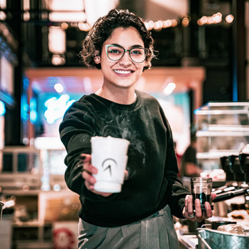 Anytime is a good time for a cup of coffee. This result was naturally obtained at the coffee shop during a work shift only using natural light and a spontaneous smile.