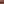 Becoming the Sand-<br />
In the heart of the desert where silence speaks in golden tones , a woman is blending with the dunes . A moment where the human spirit merges with the rhythm of the world , becoming one with the sand