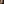 “A pure portrait of a young girl. Her gaze is powerful and unforgettable, set against the timeless contrast of a black background.”