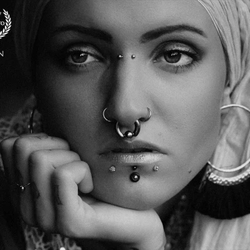 The portrait was taken with available light. She was sitting on the stairs in front of the house.<br />
<br />
P: @Christian.giger.photography (FB+IG)<br />
M: @doomed_puppet (IG)<br />
<br />
www.cg-photography.com