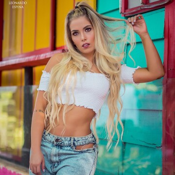 Traveling and enjoying Medellin's colors and scenery. Making this street shot to allow the model and the environment to perfectly fuse in a colorful background.