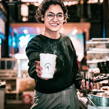Anytime is a good time for a cup of coffee. This result was naturally obtained at the coffee shop during a work shift only using natural light and a spontaneous smile.