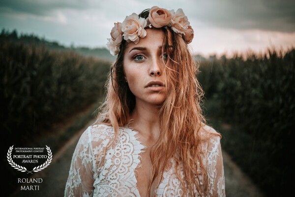 This picture was taken at sunset between two fields and it began to rain. <br />
<br />
Photographer: @roland_marti_photography<br />
Model: @_jolieyanay
