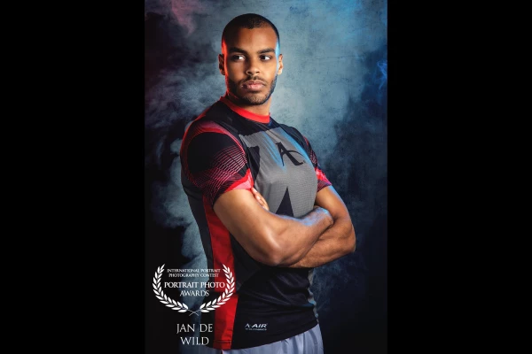 This is Tyron Lardy, a member of the Dutch Karate team. We did this shoot with some smoke and some color at the end of the shoot with this photo as a result.