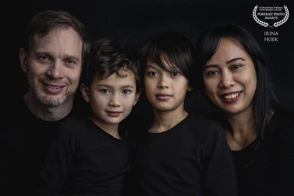 The portrait of this beautiful family was made at their house. Everything went smoothly except at th...