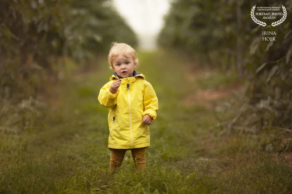 A girl amongst the cherry trees.