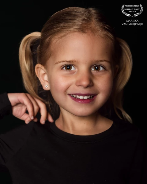 I took this portrait during one of my 'Portretjesdagen'. This little one did such a great job; full of personality and patience!