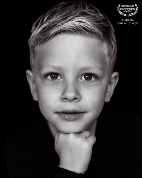 Captured during 'Portretjesdag'. Full of curiosity, calm, and quiet confidence.