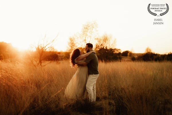 'Two hearts, soon to be three, glowing in the golden light of the sun. Like a dream caught between n...