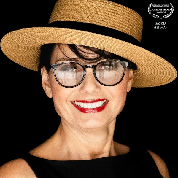 Beautiful Patricia with red lips and classy hat
