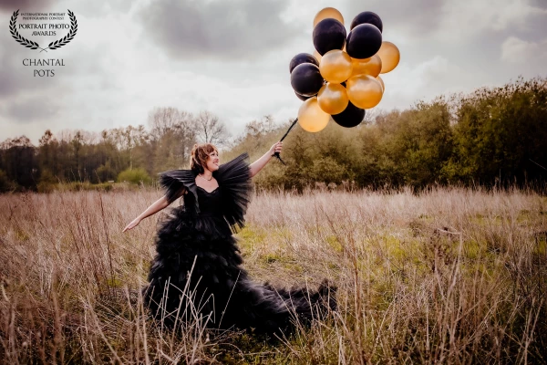 In this striking “Sweet 50”,  a woman radiates confidence and joy as she celebrates a milestone in s...