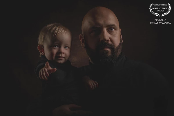 Father and son in an intimate, simple portrait – a bond that needs no words.