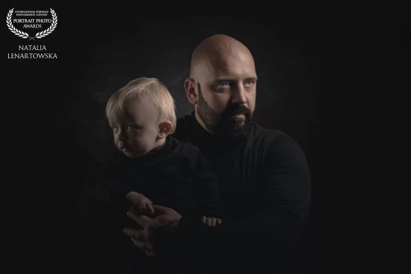 No props. No decoration. Just the pure bond of father and son.