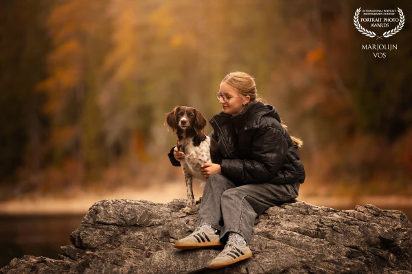 My daughter sits on this rock by the Eibsee, with our Heidewachtel Coosje close by her side.
The mou...