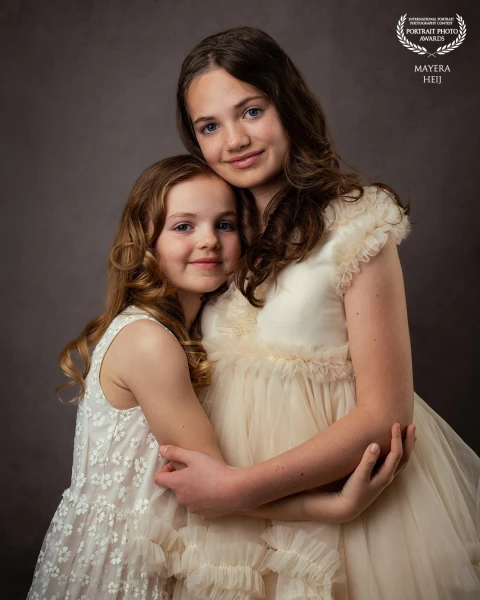 A portrait of two sisters. I love capturing the love between two people.