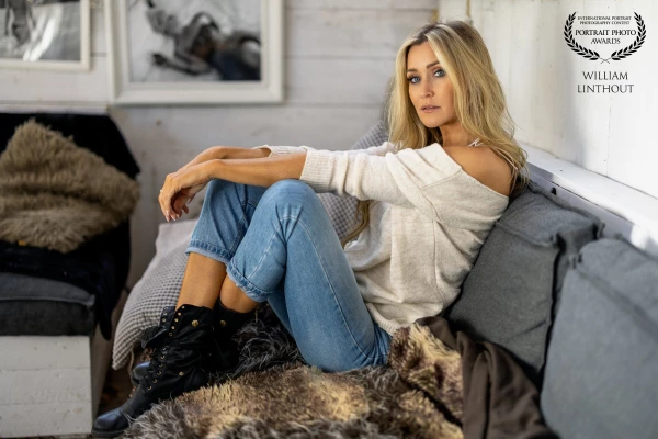 Photoshoot in a normal living room setting with natural light.