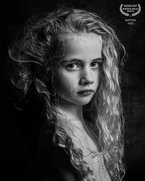 A portrait of this girl.  Taken in my studio using my favourite lighting setup.