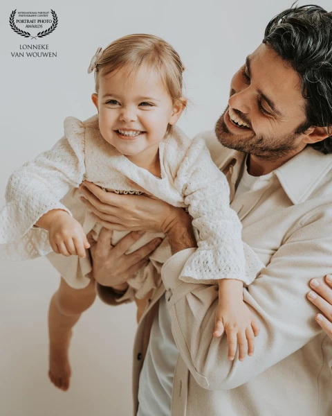 Sweet little Sophia had her giggles with her dad at the photoshoot.