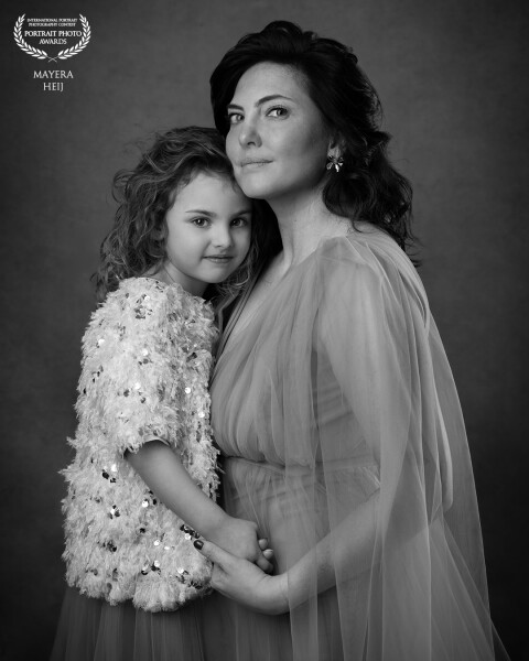 A portrait of a mother with her daughter.