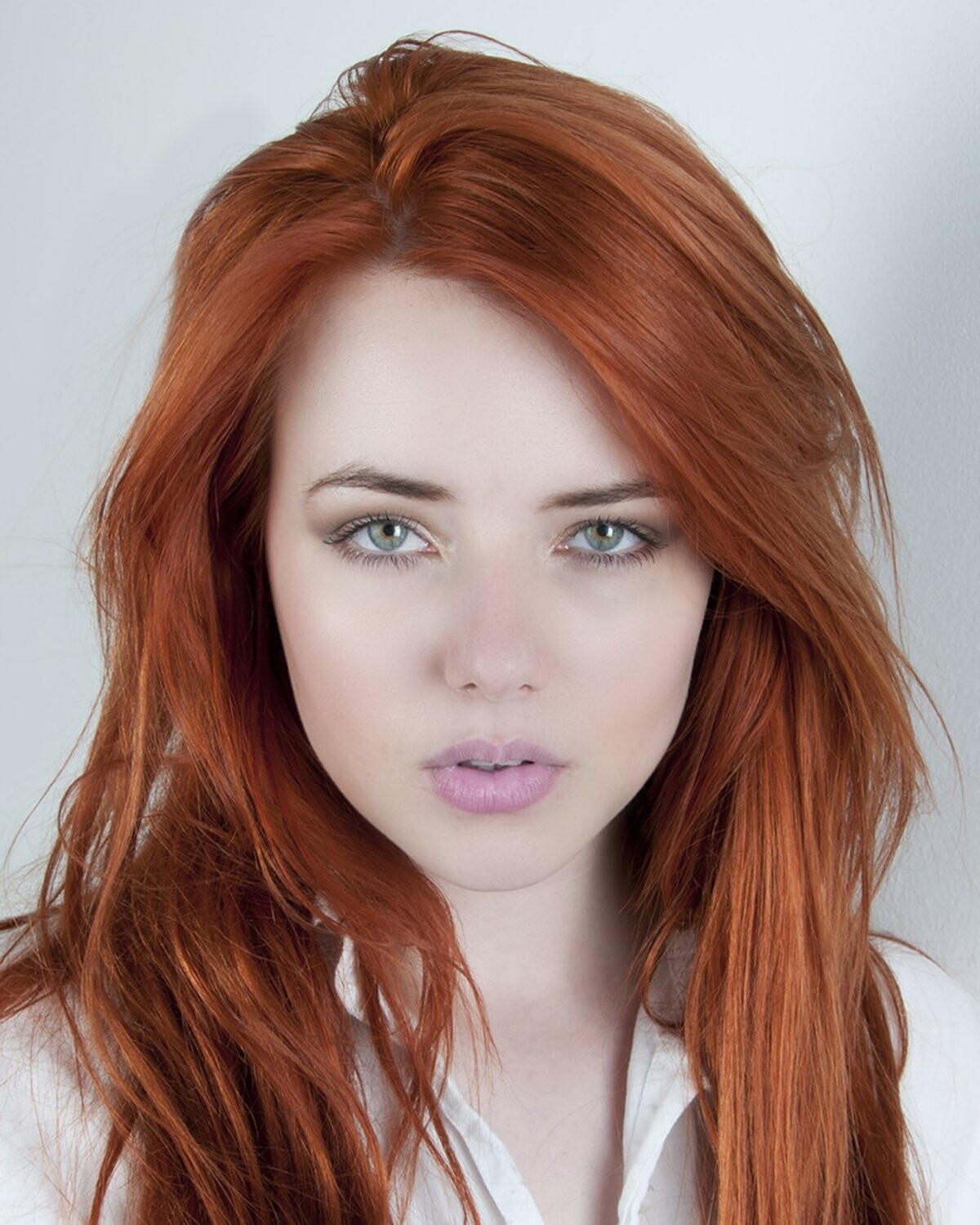 This was from an early shoot of model Ash Millman, taken in a studio with plenty of natural light This was shot against an infinity curve and using one soft box . Ash had very little make up and is a very natural shot.
