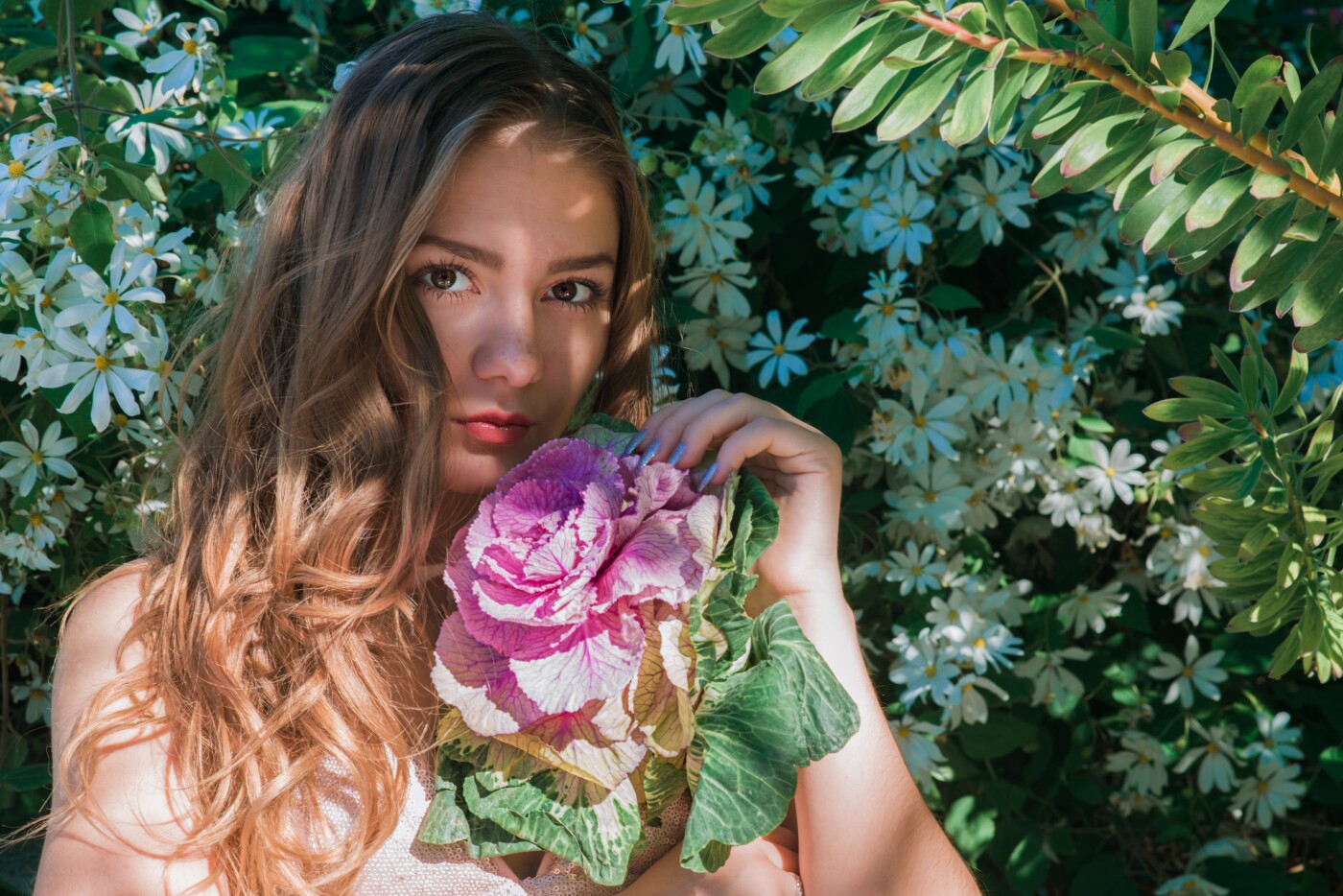 @alex_ride is The model in this photo. We set up a shoot in downtown Los Angeles and she brought a beautiful flower arrangement with her. She took it apart and go this cabbage out of the arrangement and we decided to get some shots with it and I was able to capture this shot of her. <br />
Follow my instagram @optic.visionary to view more from this shoot. 