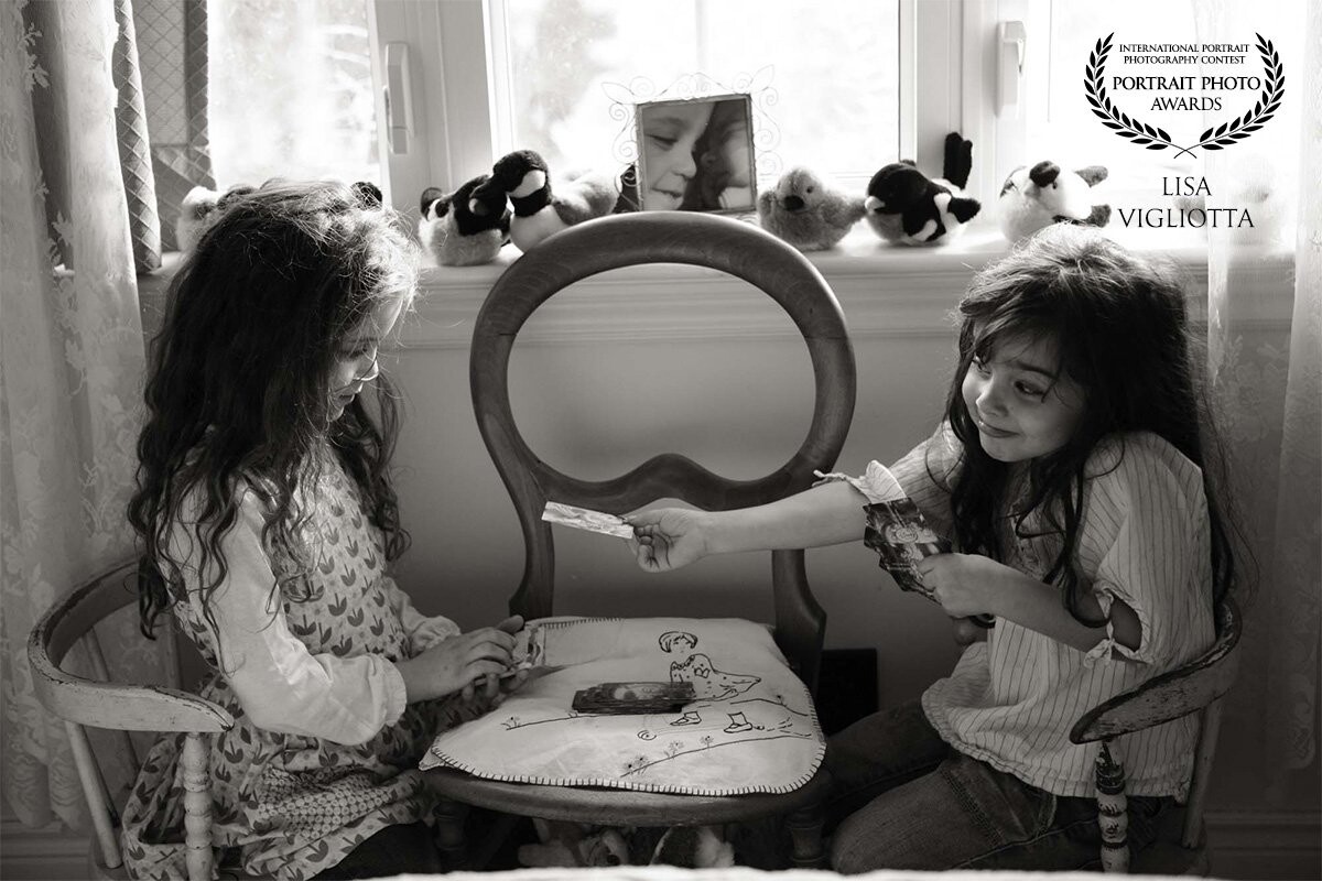 "Go Fish"<br />
This singular picture from the entire Lifestyle Session says it all...their cuteness together...the sweetness of their sisterhood. Capturing real life between siblings has to be the icing on the glorious cake that is called by dream job. 