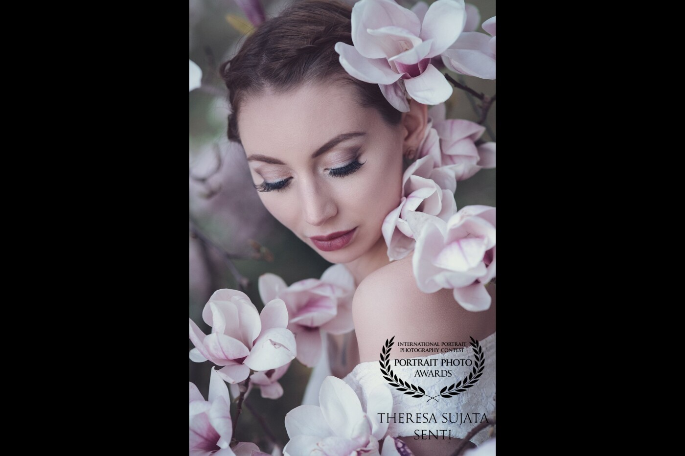 I met with Desirée after work in her garden. This beautiful magnolia tree was standing there, in full bloom. It was almost dusk and the wind was also rather cold but we decided to do a little portrait session anyway. No regrets. <br />
Photographer: SujARTa / Theresa Sujata Senti<br />
https://www.facebook.com/SujARTa.Photography<br />
https://www.instagram.com/SujARTa.Photography/<br />
Model: Desirée Didouche<br />
https://www.facebook.com/Kosmetik.Visagistin/<br />
https://www.instagram.com/desiree_jessica/<br />
