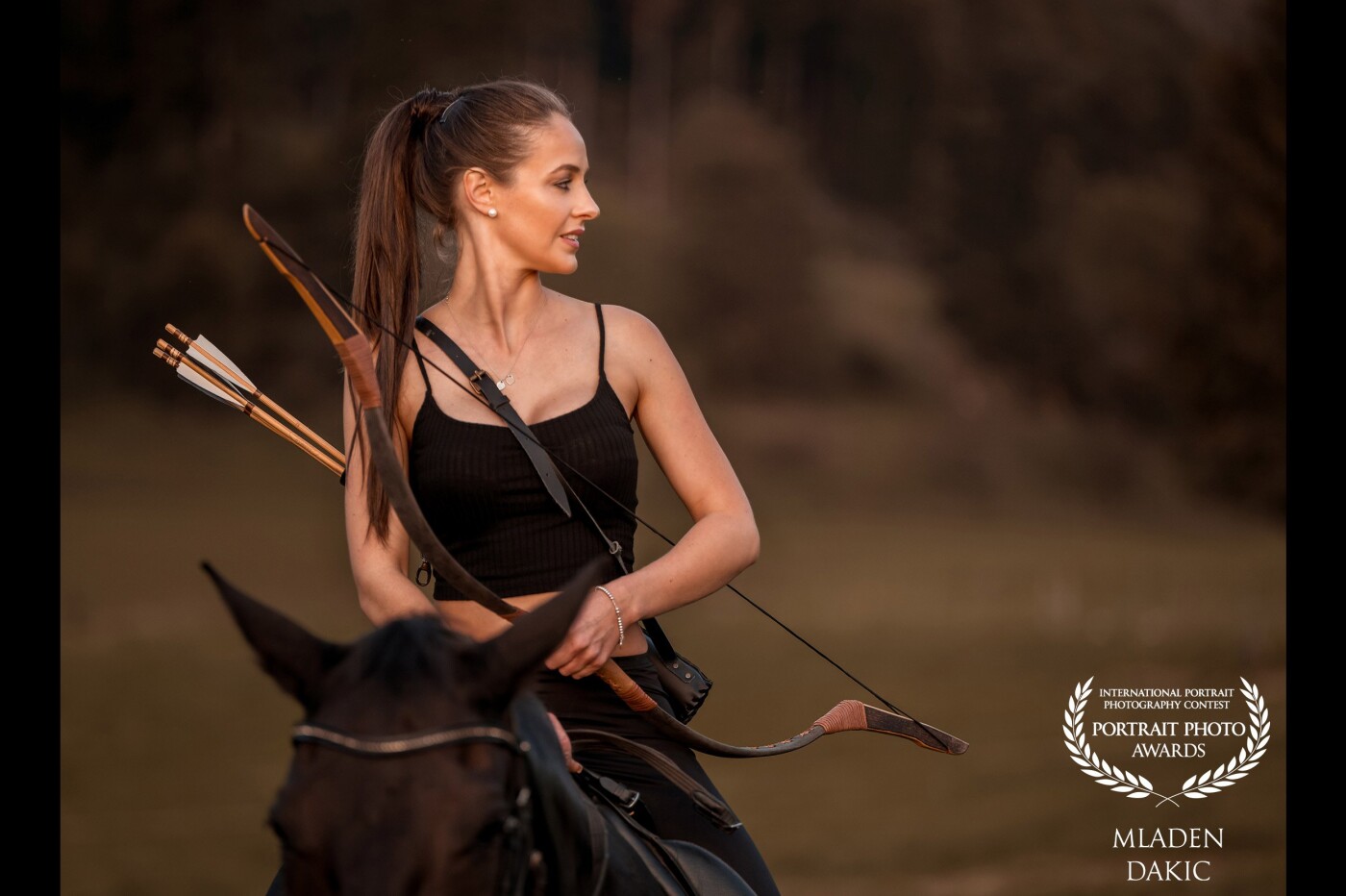 With Stephanie, we had the goal to make some nice huntress style photos in a beautiful sunset light! We tried a lot and as a result, we made a few very nice pictures this evening. Also wed learned, how difficult it is to shoot with animals. I like this picture the most because the model is in the focus and the horse plays a minor role. I called it "Huntress with a bow".<br />
Only the nice evening sunset light was used.