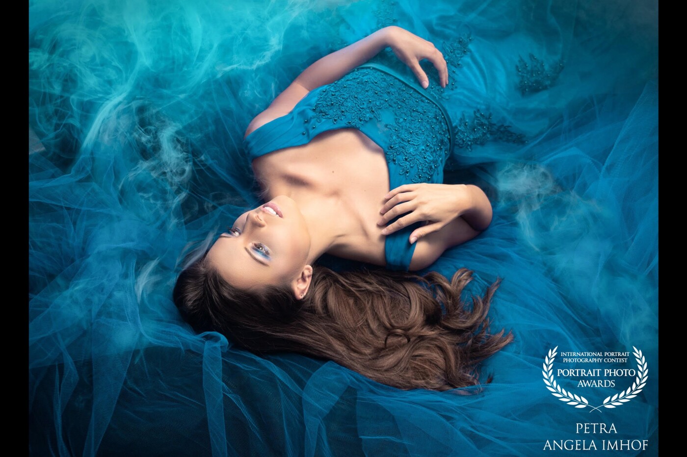 Foggy Dream in Blue...<br />
Created in the Studio, flat on the floor with a hint of Fog and lots of Fabric.<br />
Model: Ellie.Zo (CH)<br />
Foto, Make Up and Editing: BeautifulDamages<br />
Assistant: MarcHerm.Foto