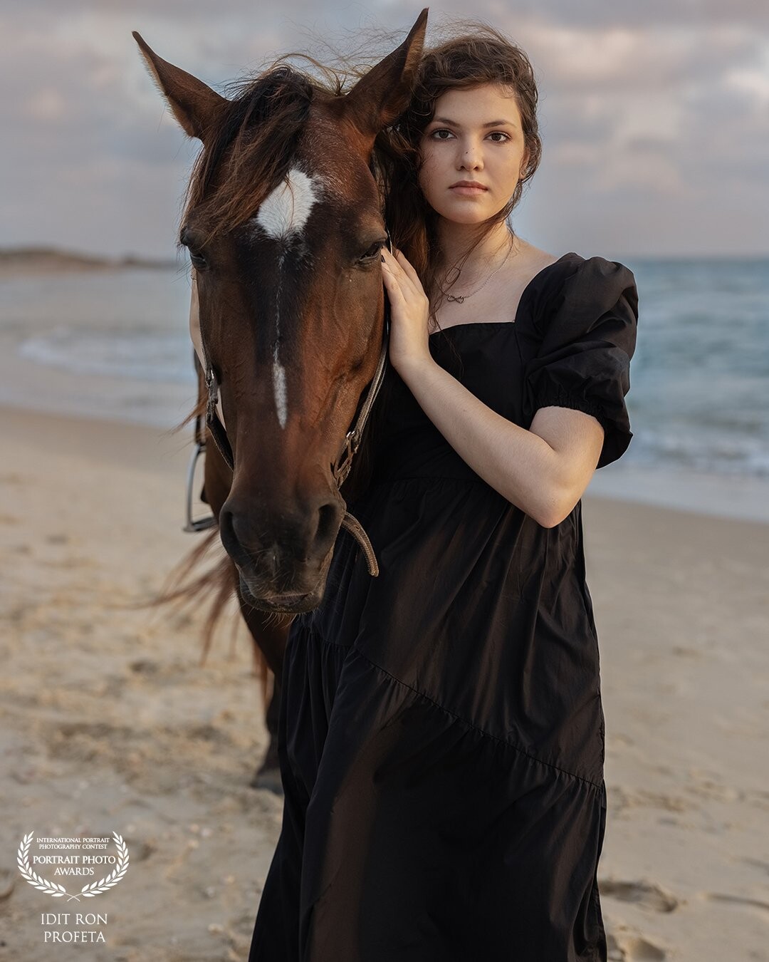 The picture was taken on my daughter's 15th birthday, she loves animals very much, she had a dream to be photographed with horses and I made it come true for her, in the picture she is photographed with the beautiful Zoro.