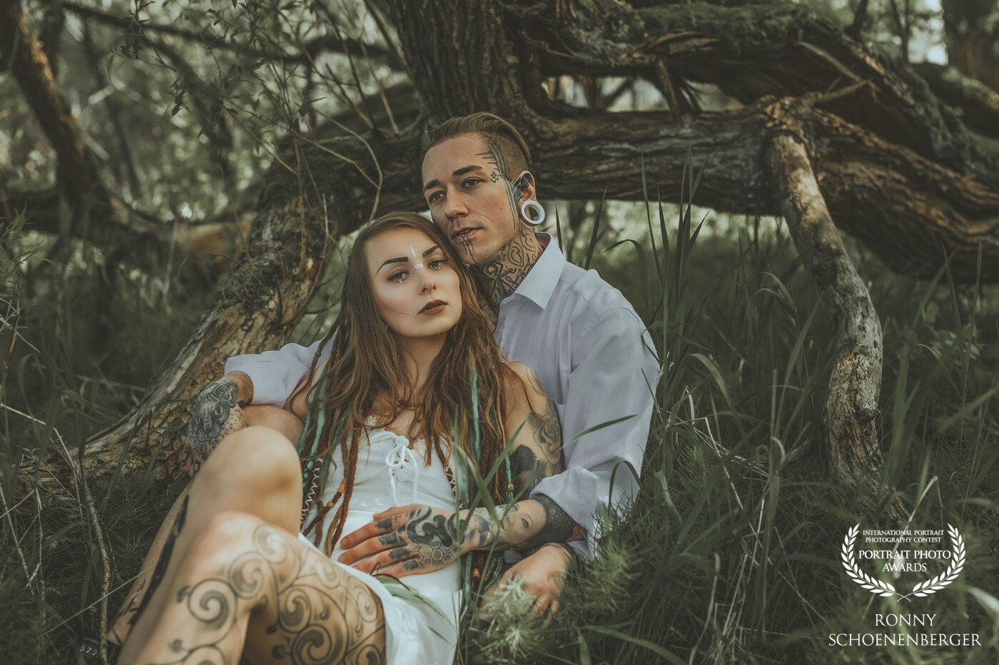 The first, but definitely not the last photo shoot with this tattooed model couple. Our shoot took place on a cool spring day in a small green spot by the lake ...<br />
<br />
I call it "between the trees"<br />
<br />
I like the picture very much and it was taken with natural light ...