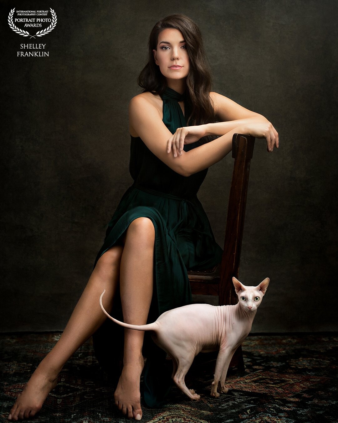 Feminine/Feline<br />
<br />
I photographed this beautiful girl and her cat in her photography studio in downtown Phoenix. <br />
<br />
I posed her and allowed her cat to walk around while we shot, then took my favorite image of the cat and composited it with my favorite image of her. I wanted their expressions and connection to the camera to feel similar; and I love how this one came out.