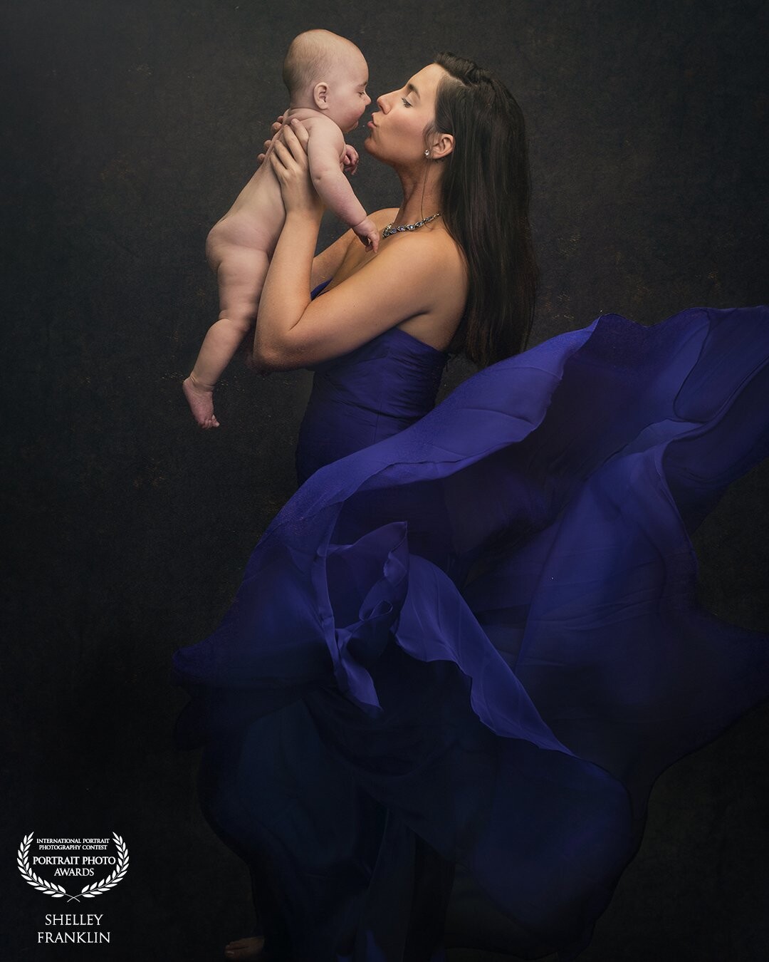 I wanted to create artwork for this new mother;  and an image that shows a glamorous side of motherhood.   I think a lot of new moms can appreciate an image where they look gorgeous during a time they otherwise may not feel as beautiful as they once felt, simply because all of their energy and time is being devoted to a new little person who needs them.  Every  mom deserves an image to look back on that shows how happy AND gorgeous they were during this amazing time of life.