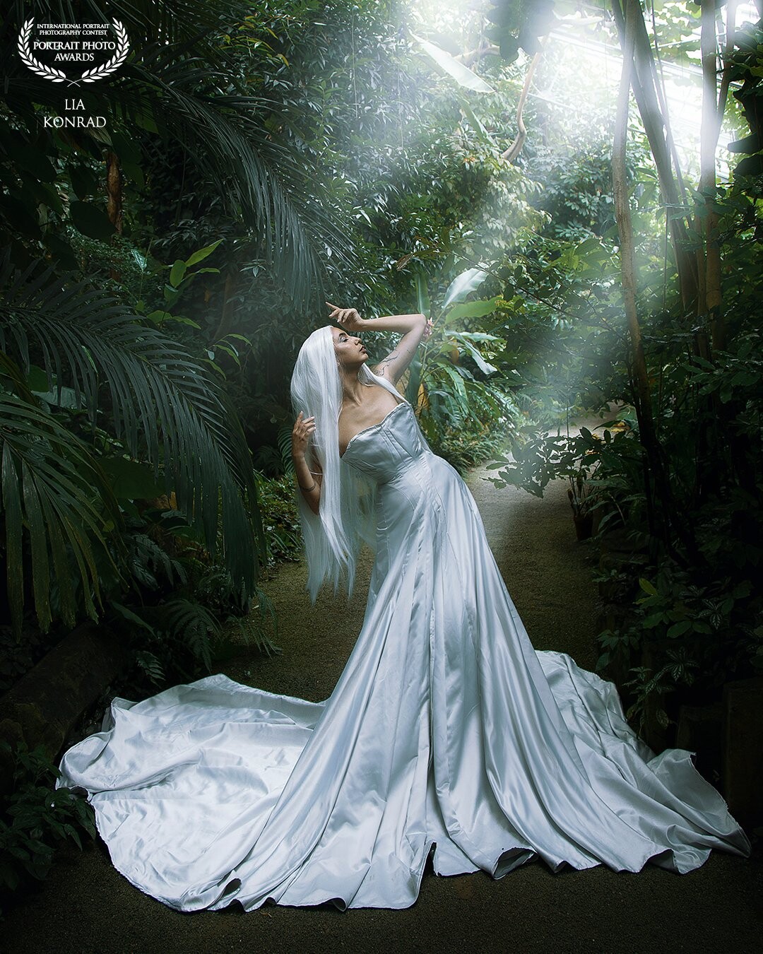 The Sylph,- with Gizzy Lovett as Model and Anton Krug as Designer.<br />
Sylphs are the elemental spirits of air. They have power over the skies and air. Sylphs been delineated to have control over the wind and the clouds, and even have the ability to purify the air and control the weather itself.