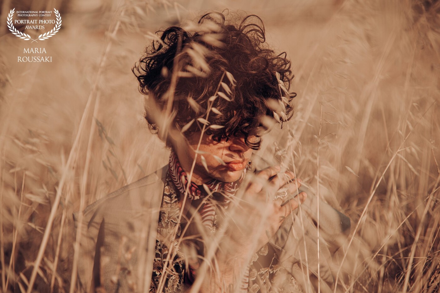 When this photoshoot started, in the beautiful island of Samos, we were aiming for some golden hour shots with the classical sea views of Greece. Quickly though, we realized the island had much more to offer. An abandoned field of dry straw and the beautiful natural lighting provided an amazing camouflage opportunity, that led to this shot.