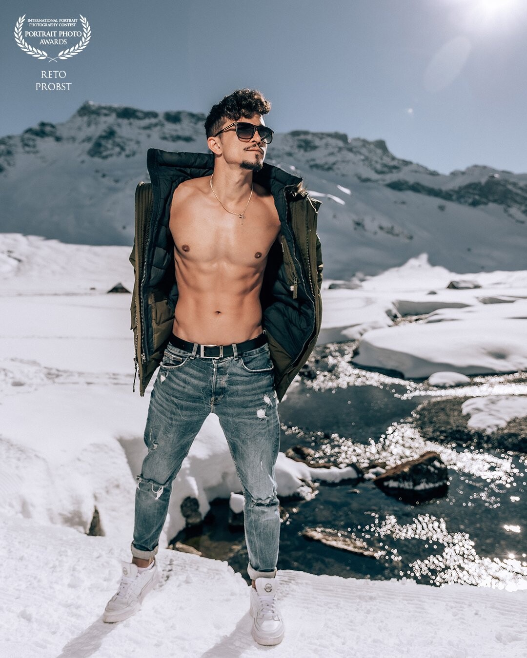 On a cloudless day in the beautiful Swiss Alps, Thiemo once again showed his modeling potential. The meltwater in the snow-covered landscape makes the mood in the picture extraordinary.