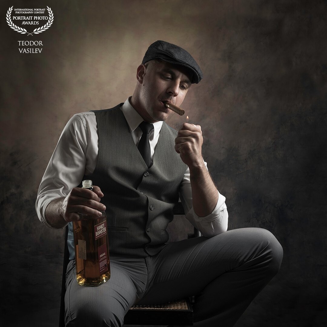 Another edit of my earlier self portrait, inspired by Churchill style photos with a cigar and whiskey. Two lights set and lighting that gives more dramatic look to the portrait.