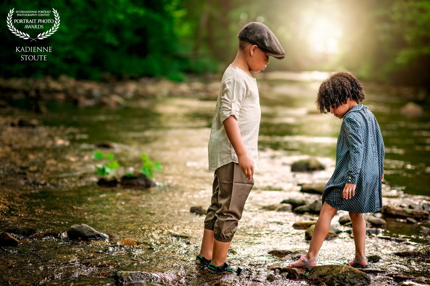 This is a portrait of my kids in the creek that runs behind our house. This was shot with a NikonZ6 and a sigma HSM 85mm 1.4 at golden hour.