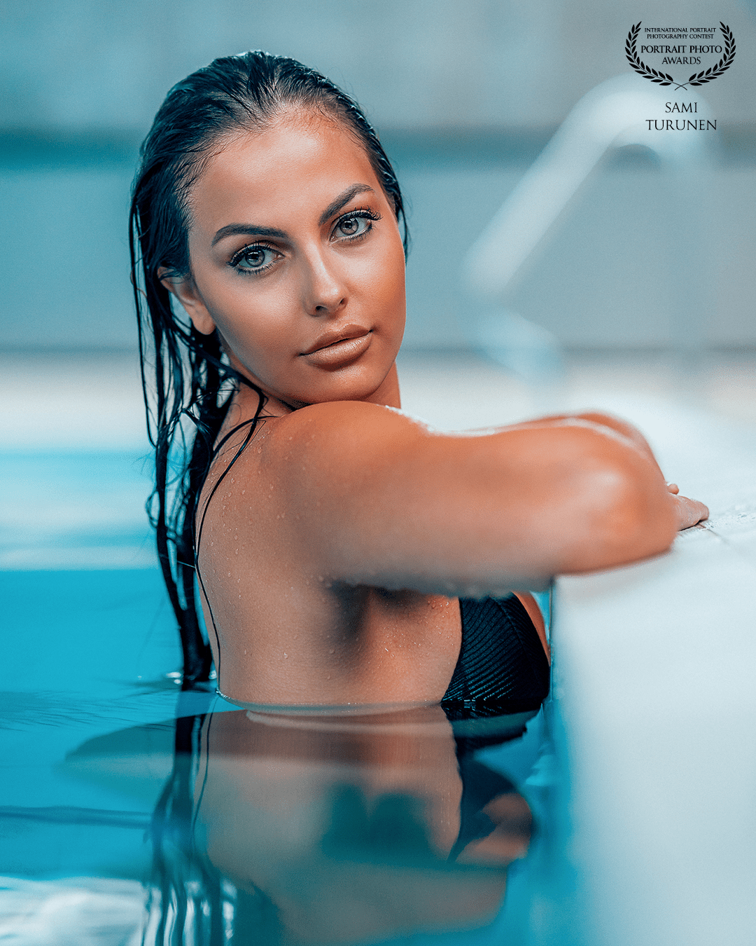 Swimming pool photo shoot. I used Godox AD600 light because we were shooting against a window and strong backlit. Model: Sahar Larbi.