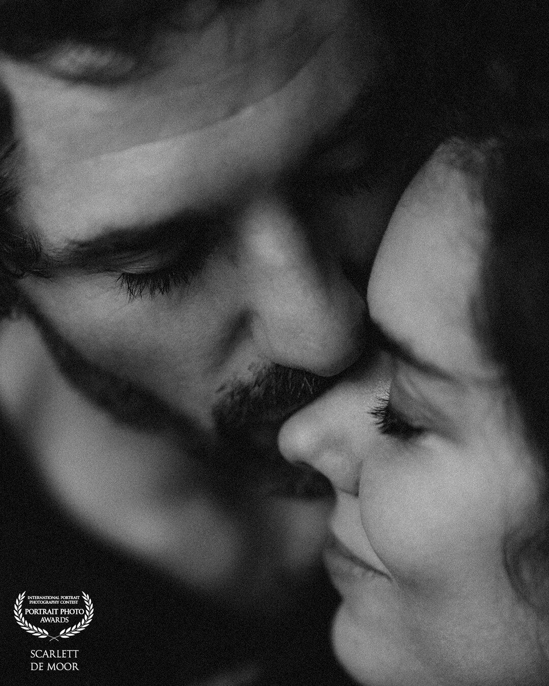 As a cinematic photographer I want to capture moments between lovers in a cinematic way. Like a still from a movie. Up close and personal. That's what you feel in this picture and that's why I love it.