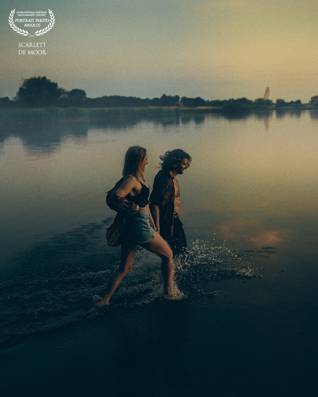 As a cinematic photographer, I wanted to create a scene where lovers would run away together. I love how this turned out. With these beautiful people, the blue hour and the haziness above the water.
