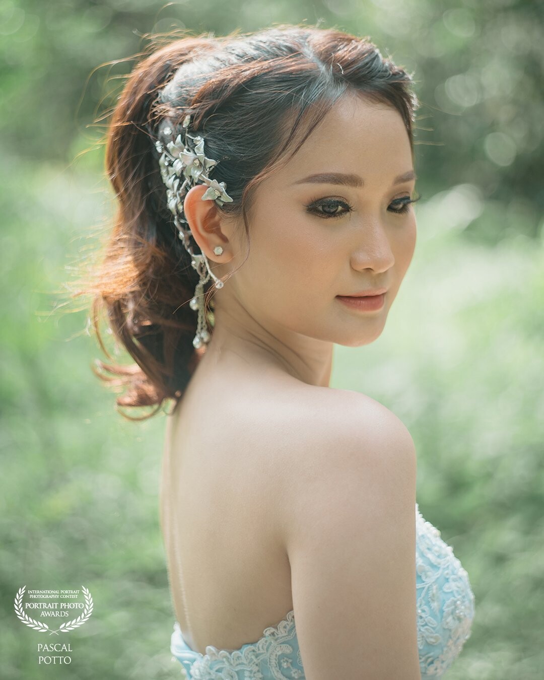 A make up shot for my pretty bride! It was almost golden hour and I took this shot before we change clothes and move to other place. With flawless make up and pretty dress I wont miss the chance to take at least a shot for her.