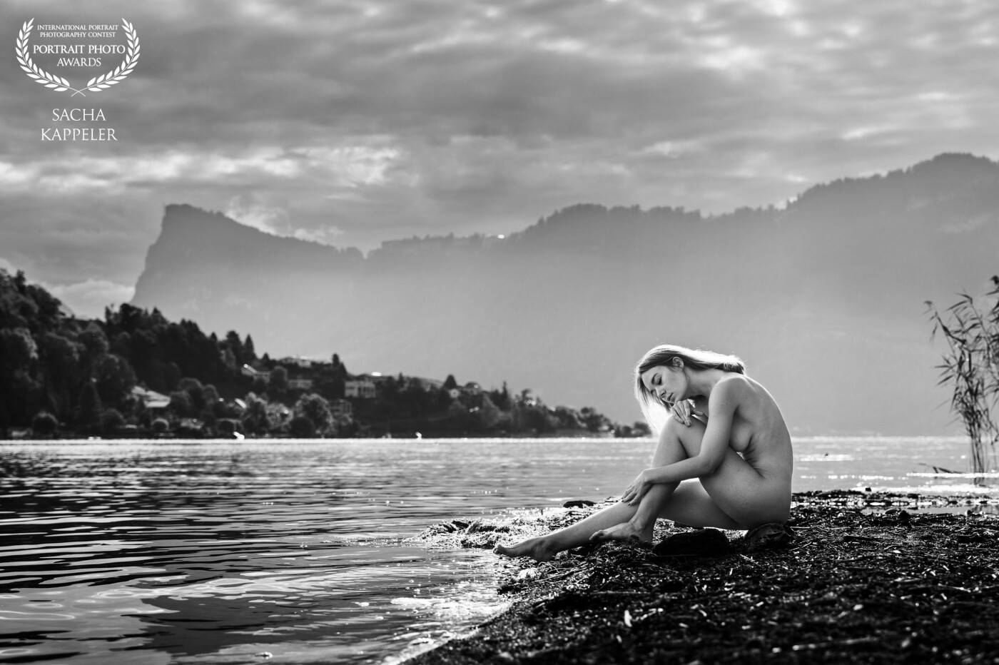 This image the model and I have created in the late summer of 2022. It was around 7 a.m. at lake Lucerne. The conditions were excellent and made the work and the result amazing. The funny thing about the shooting was, out in the lake was paddling by a rowing boat from guys during there morning training, to looking at there eyes and mouth was price less.