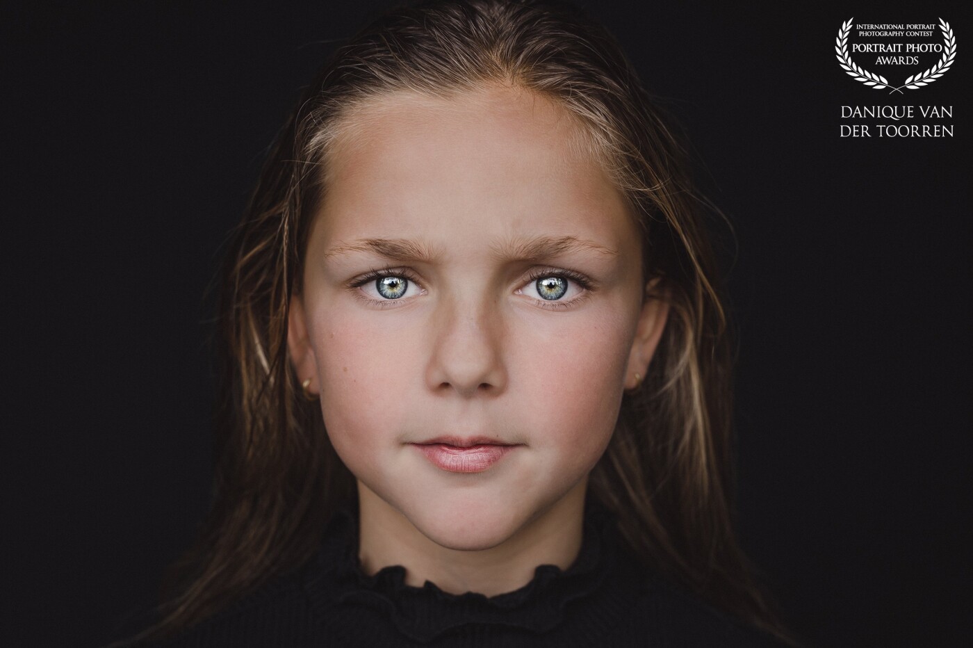 My own model Ravenna, my beautiful 9 year old daughter.<br />
Her face and her eyes show how beautiful she is.<br />
In this photo I used water in the hair<br />
<br />
Model: Ravenna<br />
Photo & Lightroom edit: @daniquevdtphotography