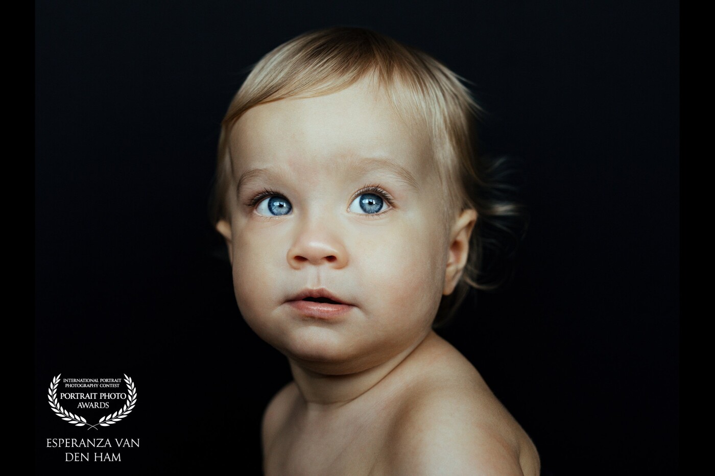 This baby came to my studio and  her eyes where zo bright. Normaly my models are wearing a black shirt. But this time i tried without to see more skincolor en it makes the photo so pure. <br />
<br />
Created by: @iamshootingportraits<br />
www.iamshootingportraits.nl