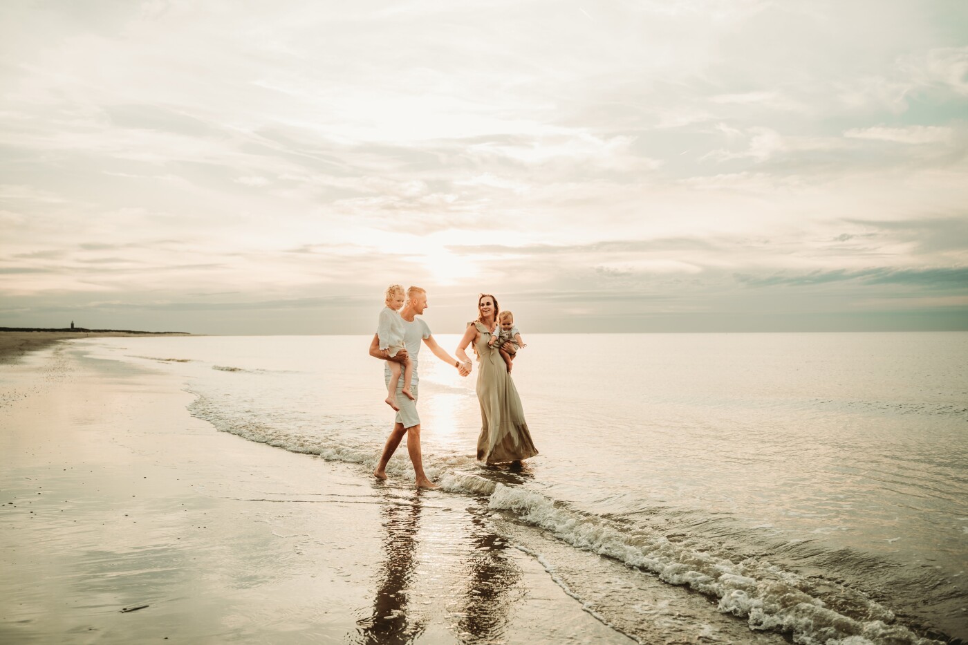 Family photo shoot on the most beautiful beach in the Netherlands, made on the island of Goeree Over...