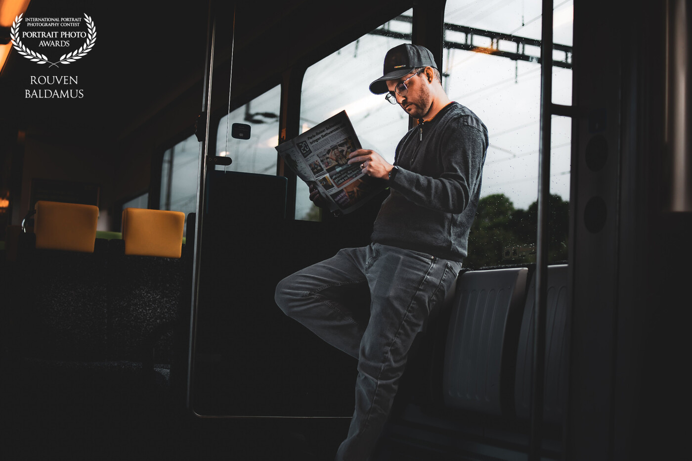 This is a spontaneous picture of a train driver reading a free newspaper.<br />
<br />
Model and photographer: @bald_rouven_