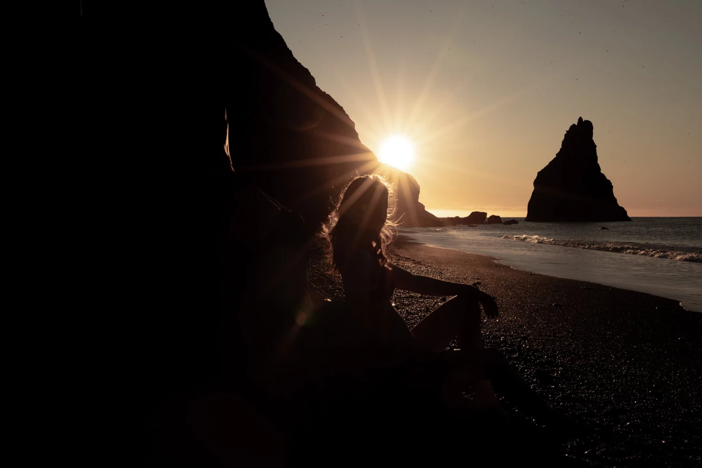 Black beach Iceland.. with an enchanting sunrise and a super handsome model