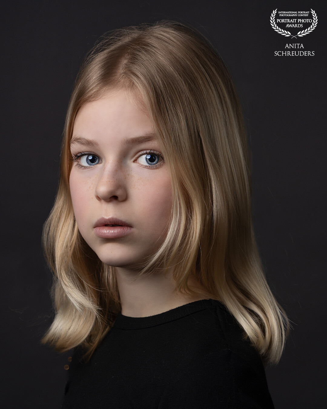 This beautiful photo of Kaat was taken during a shoot with her sister. And guess what? Her sister Fien’s photo also won an award! How fun is that! <br />
Created by: @anitaschreuders_photography<br />
www.anitaschreuders.nl